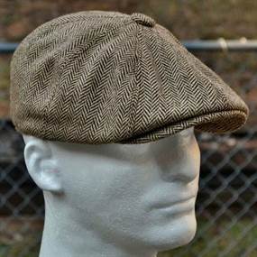 Brun sildebensmønstret flat cap
